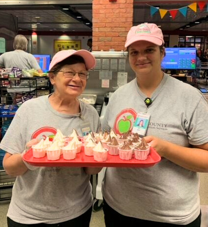 Cafeteria staff serving Annie's Frozen Yogurt